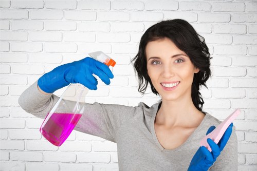 Local oven cleaner removing grease from a built-in oven in Battersea